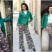 Mulher usando uma calça estampada florida e jaqueta verde em cenário urbano na primavera de 2025, destacando um look moderno e elegante.